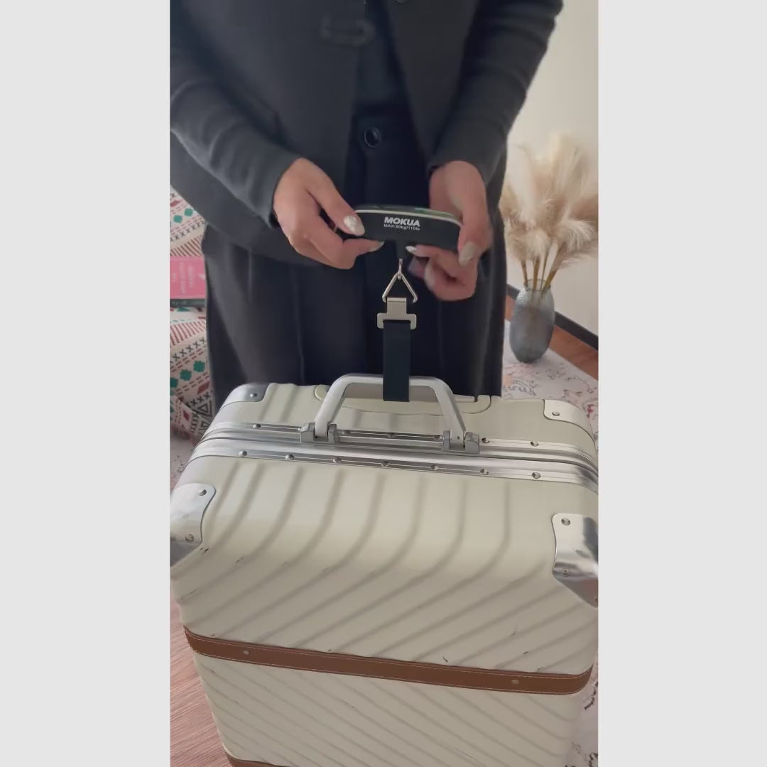 Báscula Digital Portátil para Equipaje con Termómetro y Pantalla LCD, Correa con Gancho para Pesar Maletas en Viajes