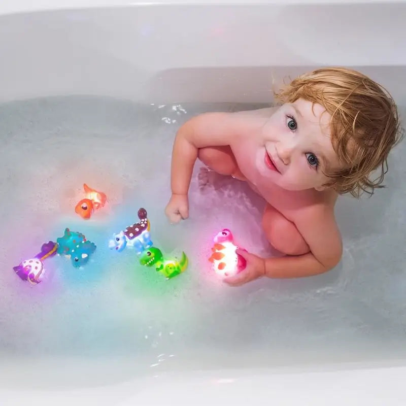 Juguetes de Baño de Dinosaurios con Luz, Paquete de 6 | Juguetes Activados por Agua que Cambian de Color | Juguetes Blandos y Exprimibles para Bebés y Niños | Luces Sensoriales para Tina Libres de Moho